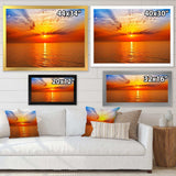 Orange Sea Sunrise under Blue Sky