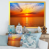 Orange Sea Sunrise under Blue Sky