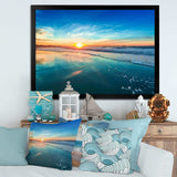 Blue Seashore with Distant Sunset