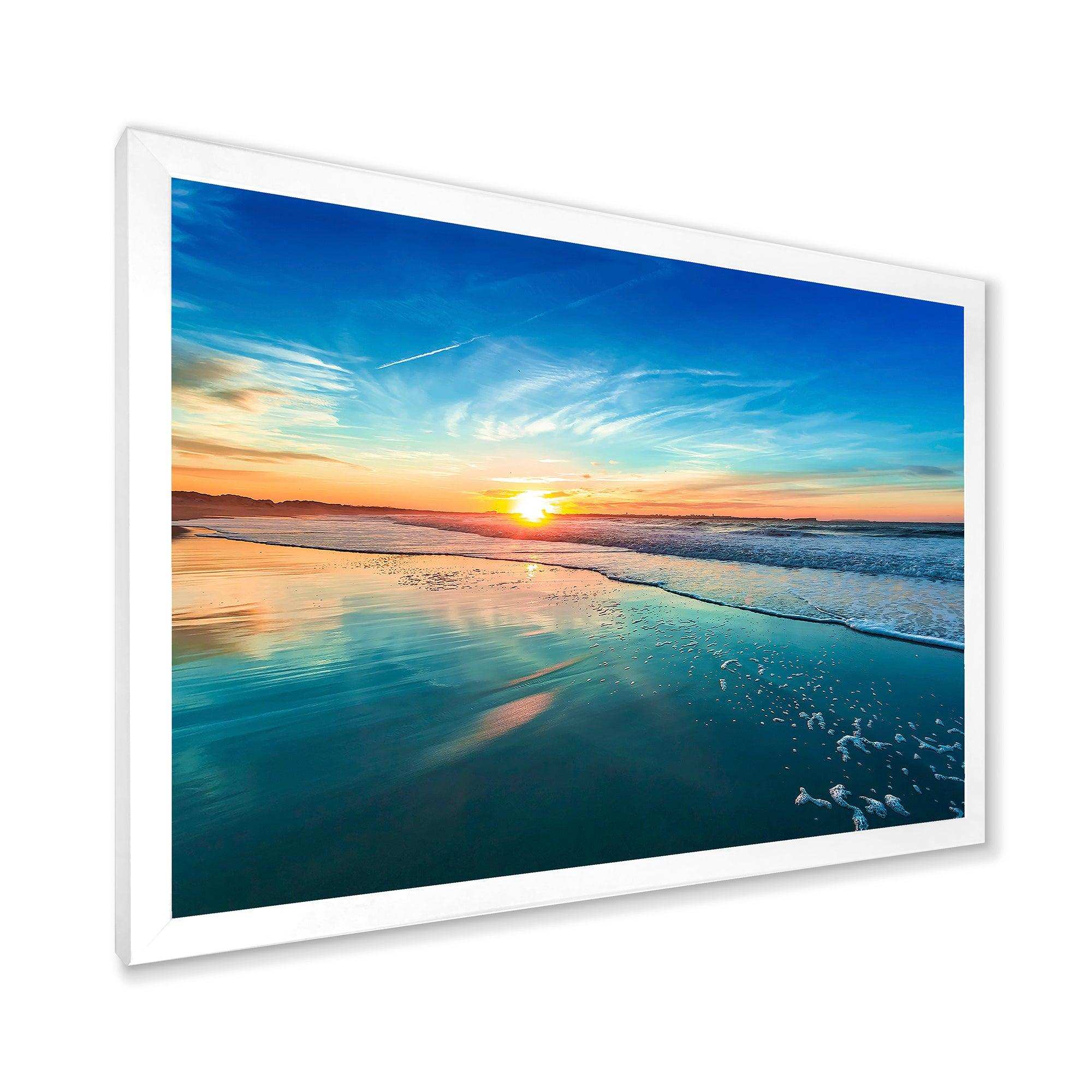 Blue Seashore with Distant Sunset