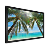 Palm Hanging over Sandy White Beach