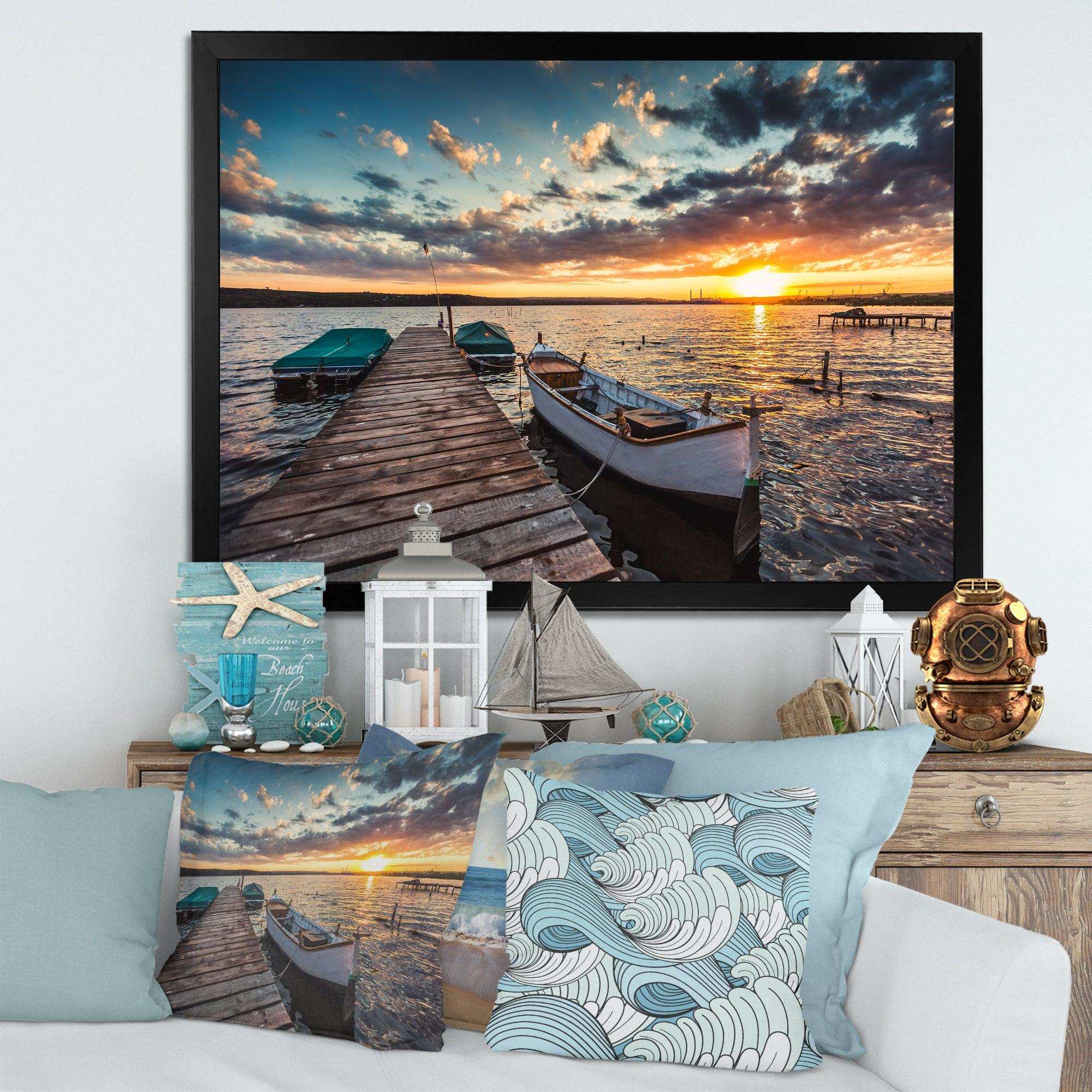 Boats and Jetty under Dramatic Sky