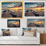 Boats and Jetty under Dramatic Sky