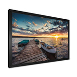 Boats and Jetty under Dramatic Sky