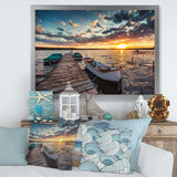 Boats and Jetty under Dramatic Sky