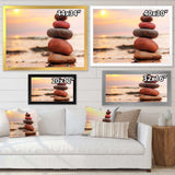 Stones Pyramid on Sand Symbolizing Zen