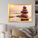 Stones Pyramid on Sand Symbolizing Zen