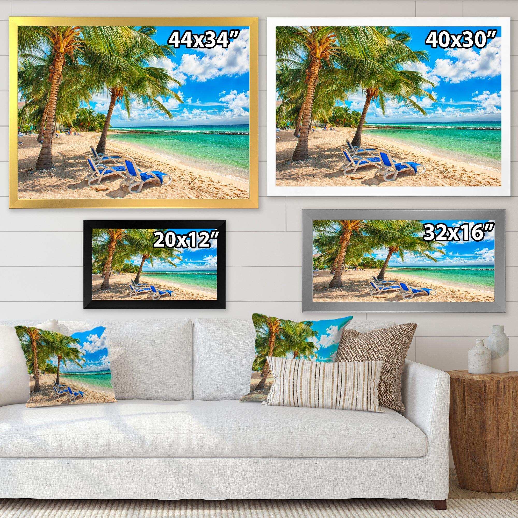 Blue chairs at the tropical white sand beach