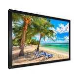 Blue chairs at the tropical white sand beach