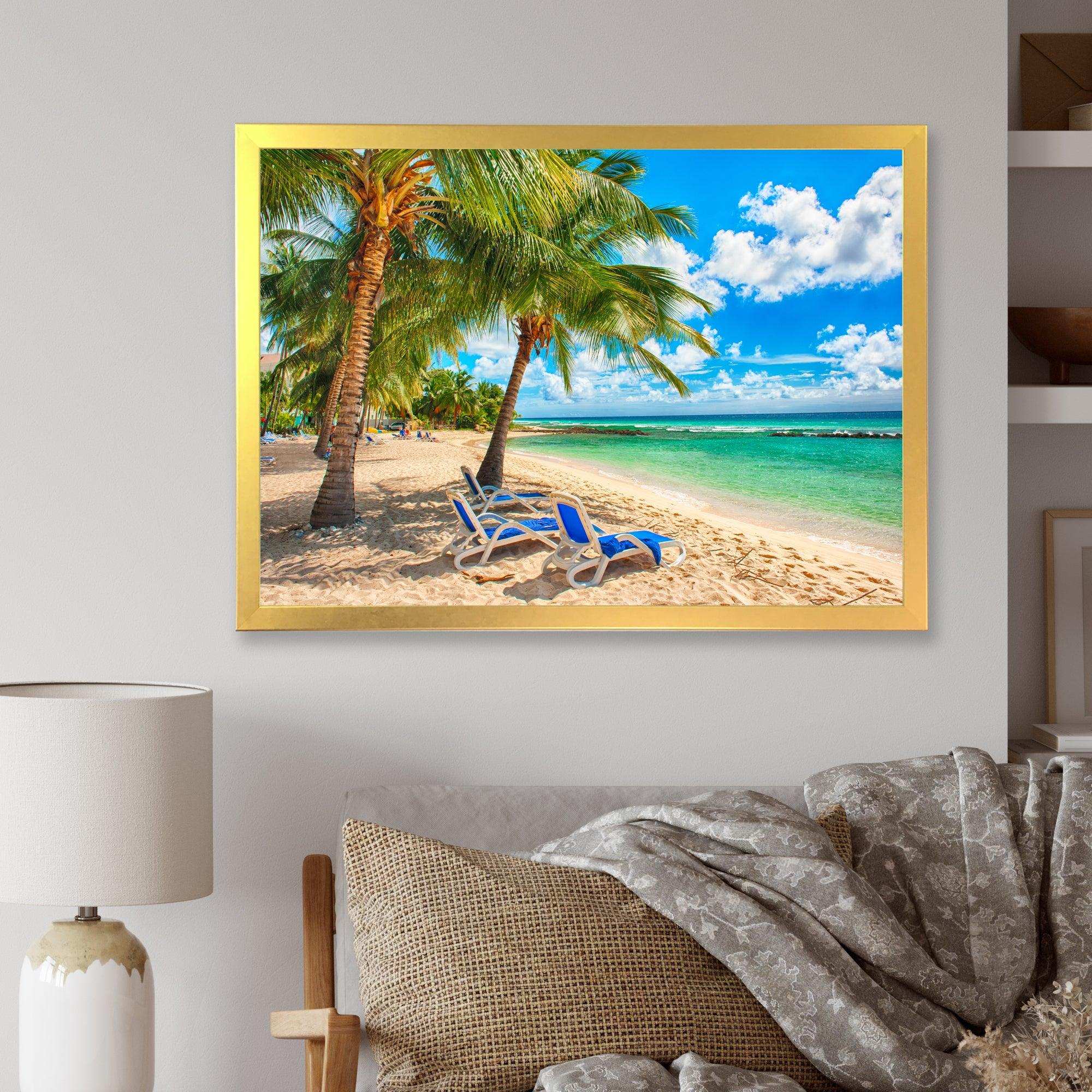 Blue chairs at the tropical white sand beach