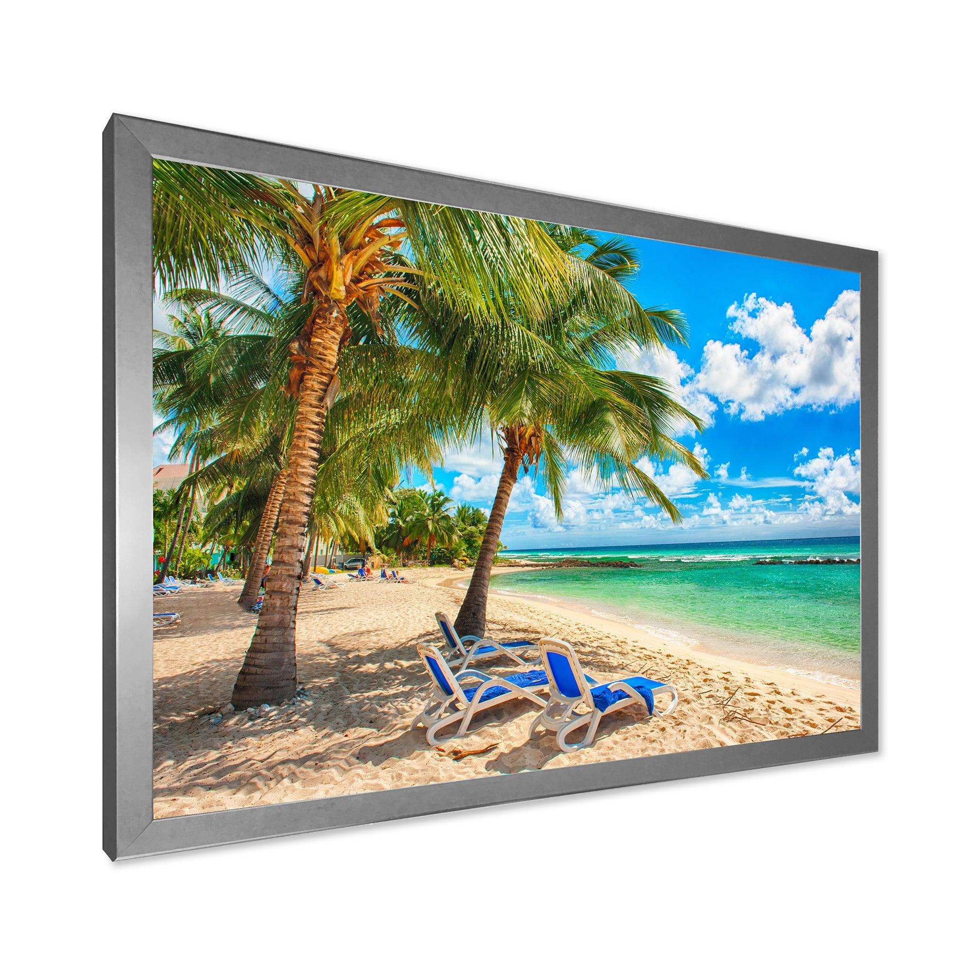 Blue chairs at the tropical white sand beach