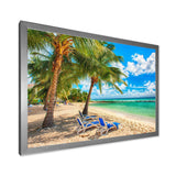 Blue chairs at the tropical white sand beach