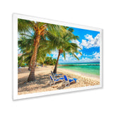 Blue chairs at the tropical white sand beach