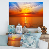 Orange Sea Sunrise under Blue Sky