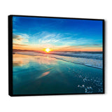 Blue Seashore with Distant Sunset