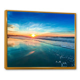 Blue Seashore with Distant Sunset