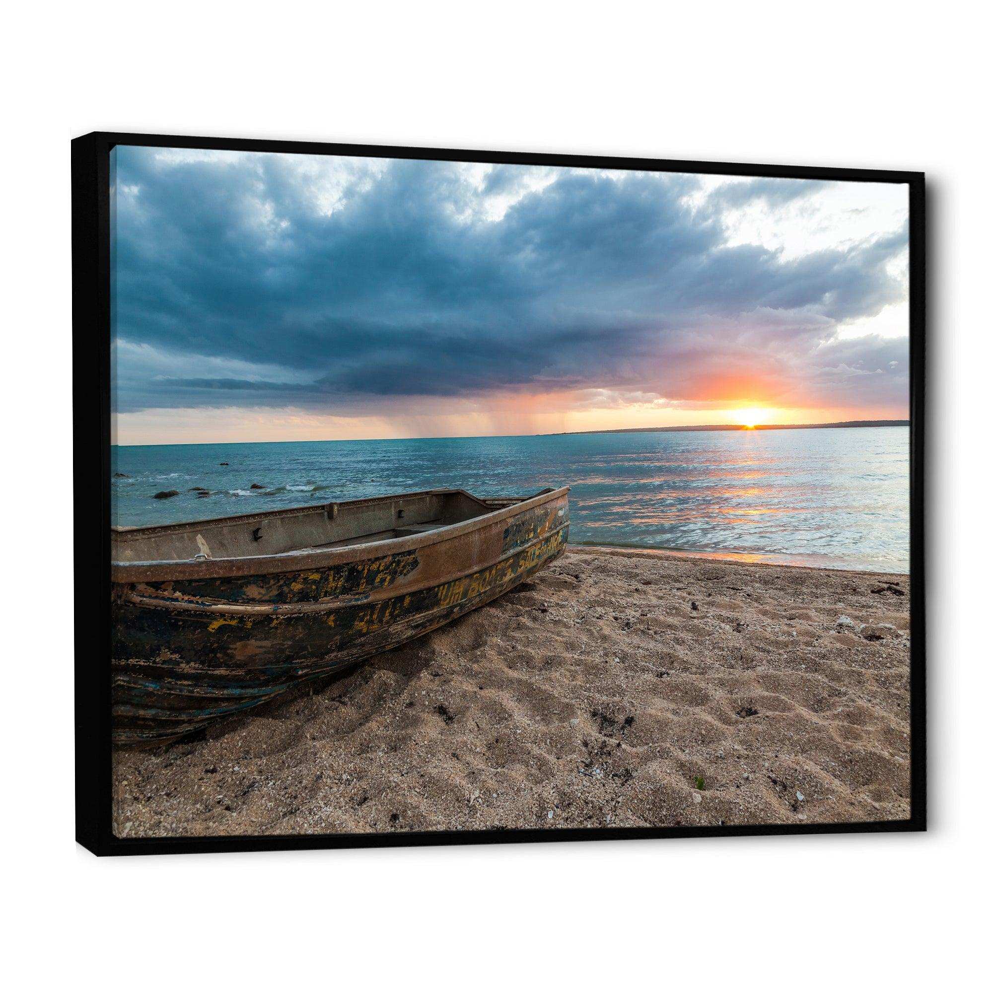 Rusty Row Boat on Sand at Sunset