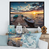 Boats and Jetty under Dramatic Sky