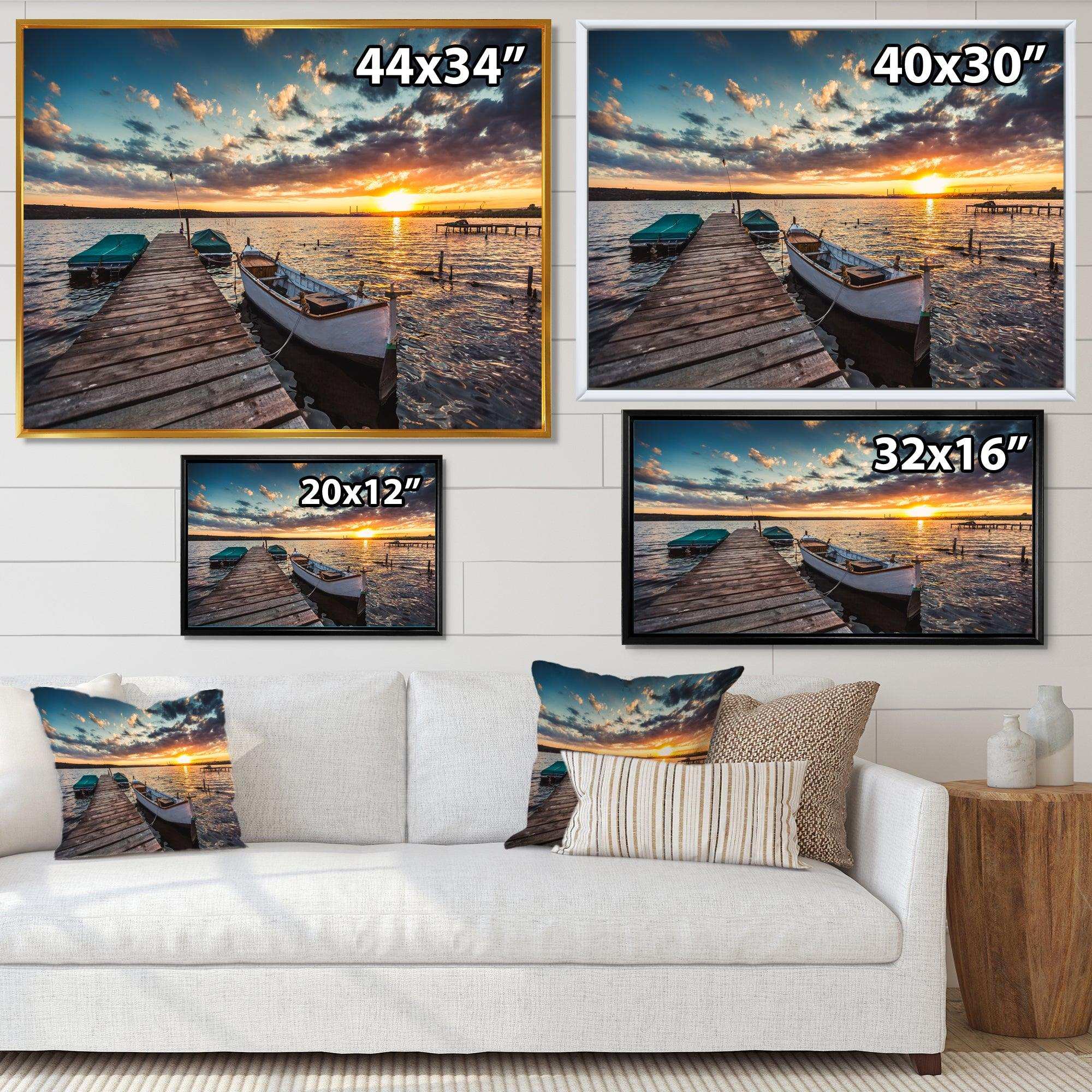 Boats and Jetty under Dramatic Sky