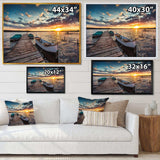 Boats and Jetty under Dramatic Sky