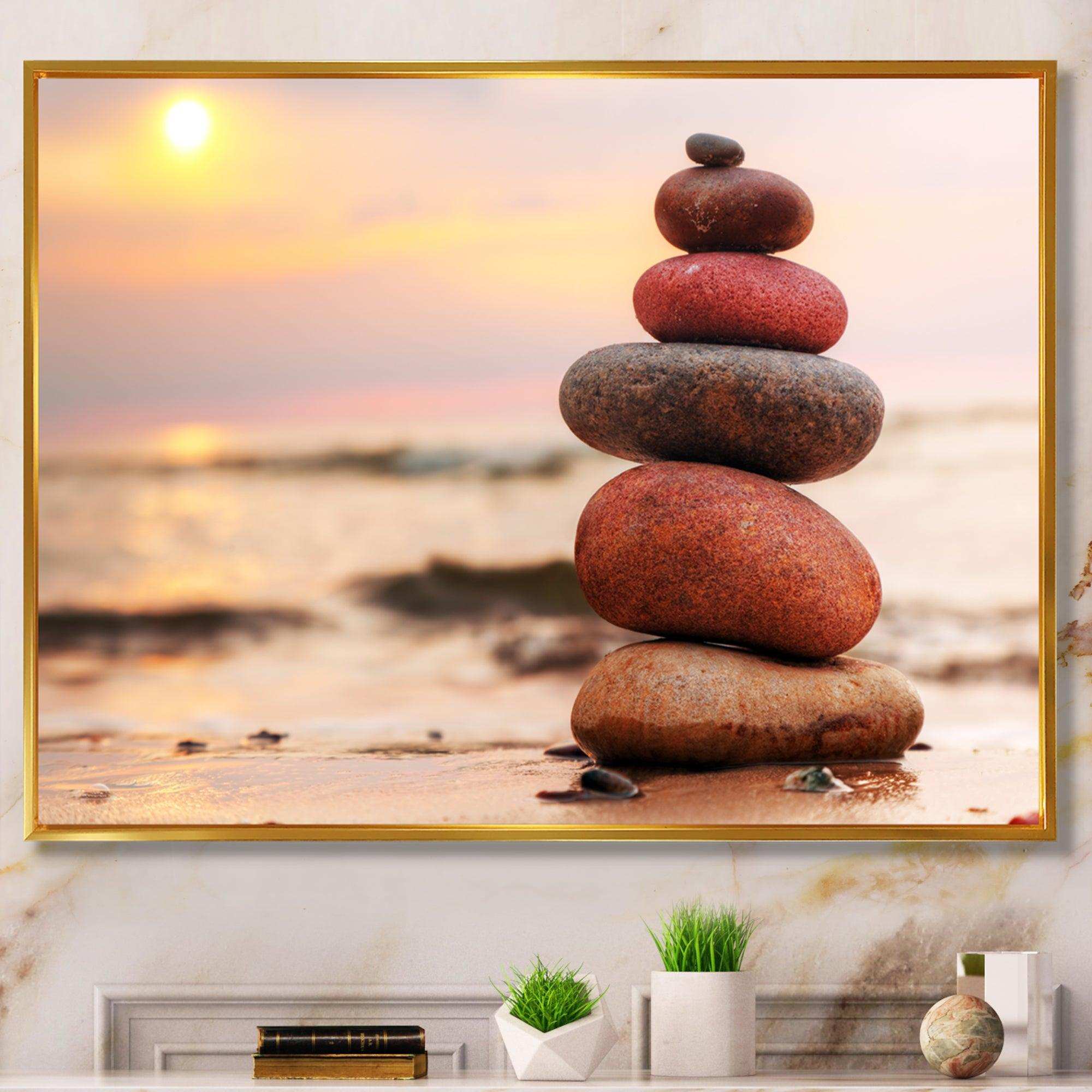 Stones Pyramid on Sand Symbolizing Zen