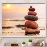 Stones Pyramid on Sand Symbolizing Zen