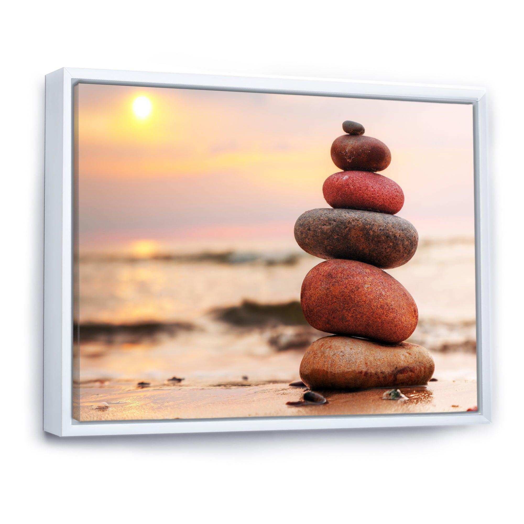 Stones Pyramid on Sand Symbolizing Zen