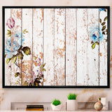 Shabby chic roses on wooden texture