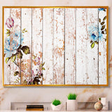 Shabby chic roses on wooden texture