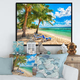 Blue chairs at the tropical white sand beach