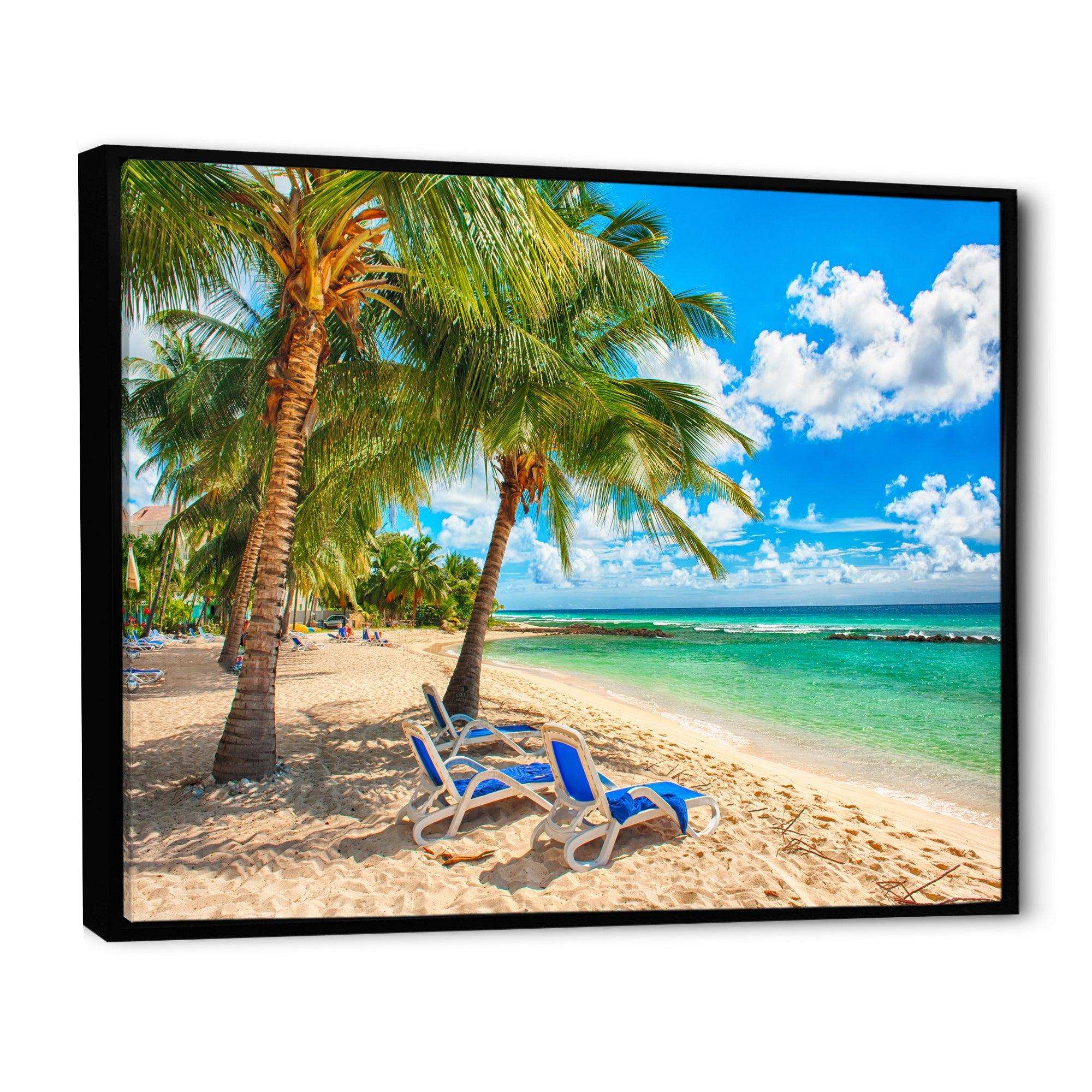 Blue chairs at the tropical white sand beach