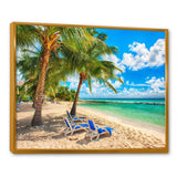 Blue chairs at the tropical white sand beach