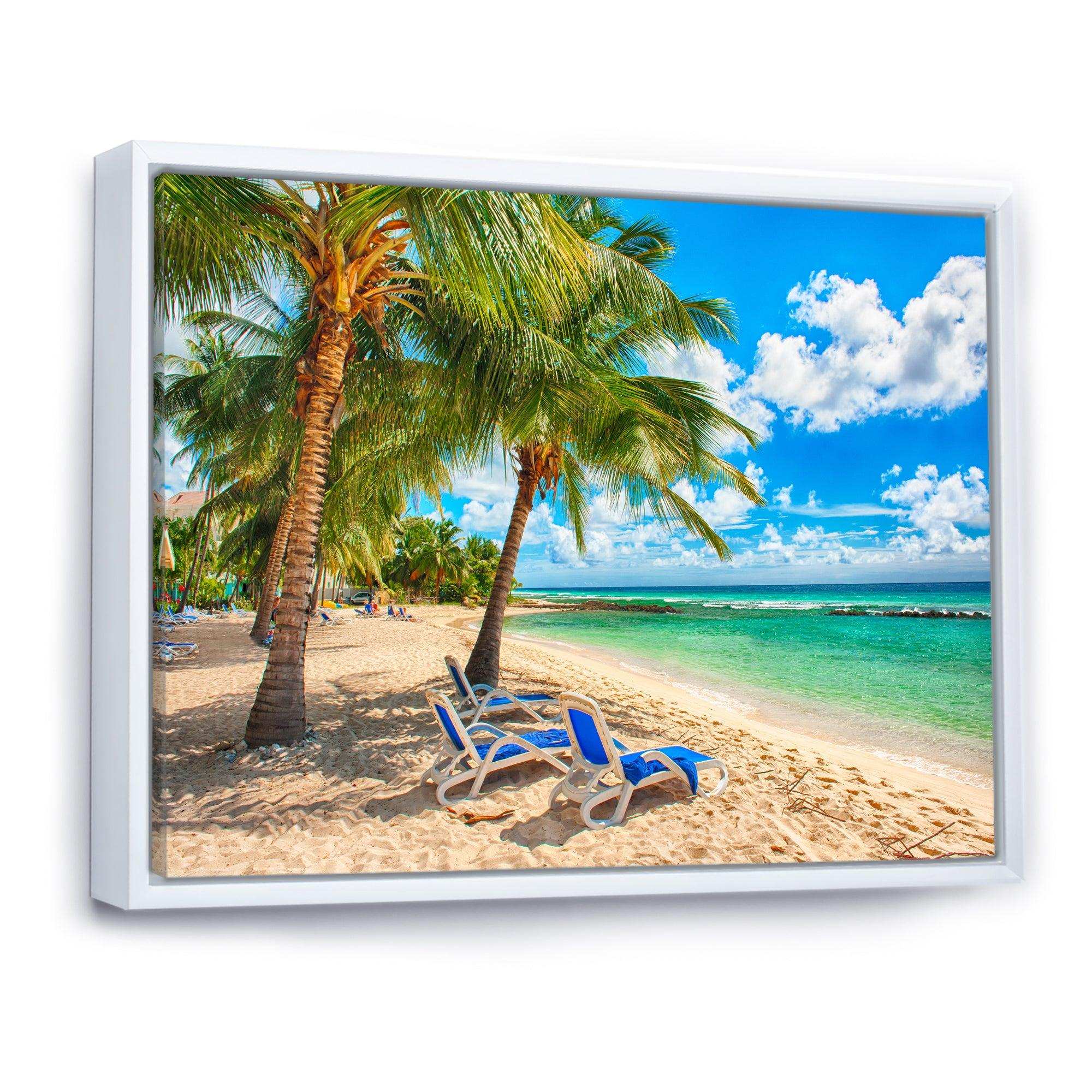 Blue chairs at the tropical white sand beach