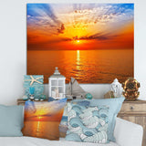 Orange Sea Sunrise under Blue Sky