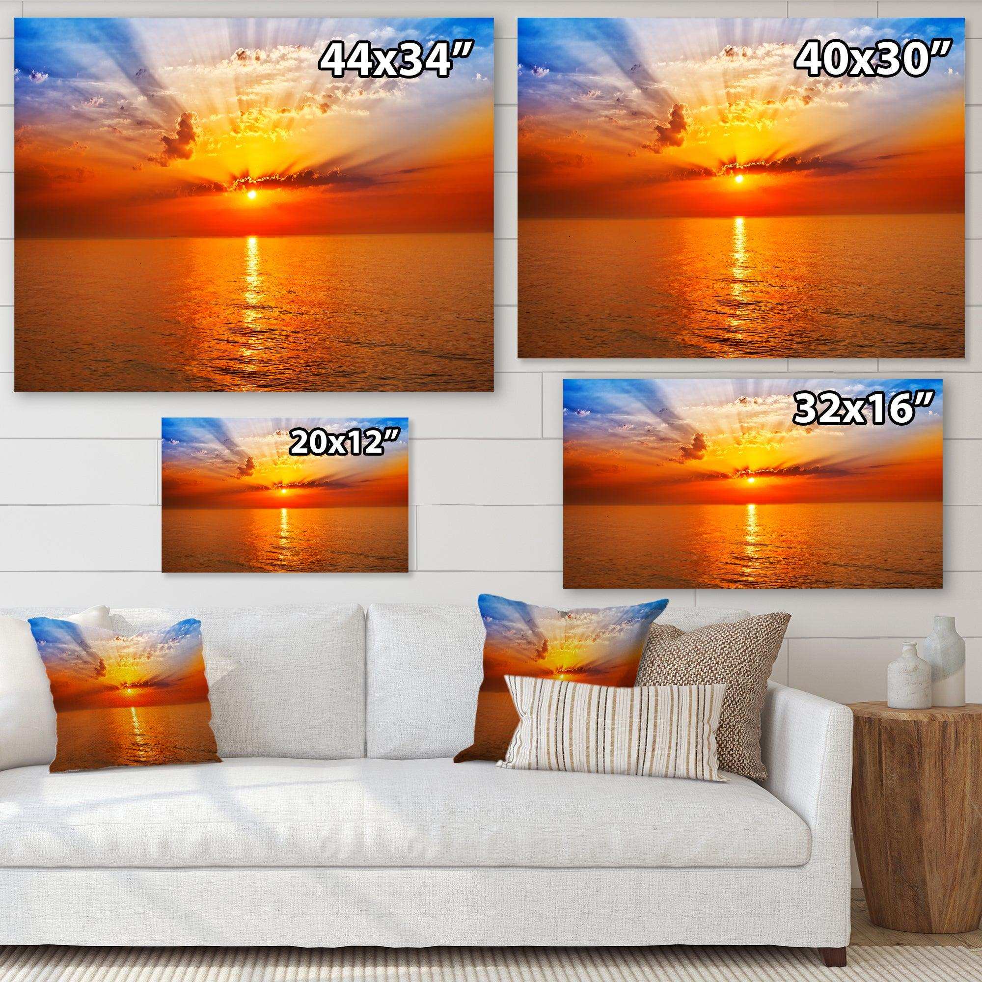Orange Sea Sunrise under Blue Sky