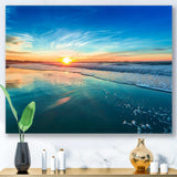 Blue Seashore with Distant Sunset