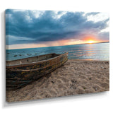 Rusty Row Boat on Sand at Sunset