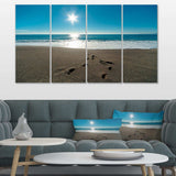 Blue Sea and Footprints in Sand Multi-Panels