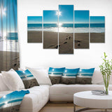 Blue Sea and Footprints in Sand Multi-Panels