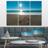 Blue Sea and Footprints in Sand Multi-Panels