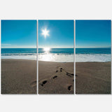 Blue Sea and Footprints in Sand Multi-Panels
