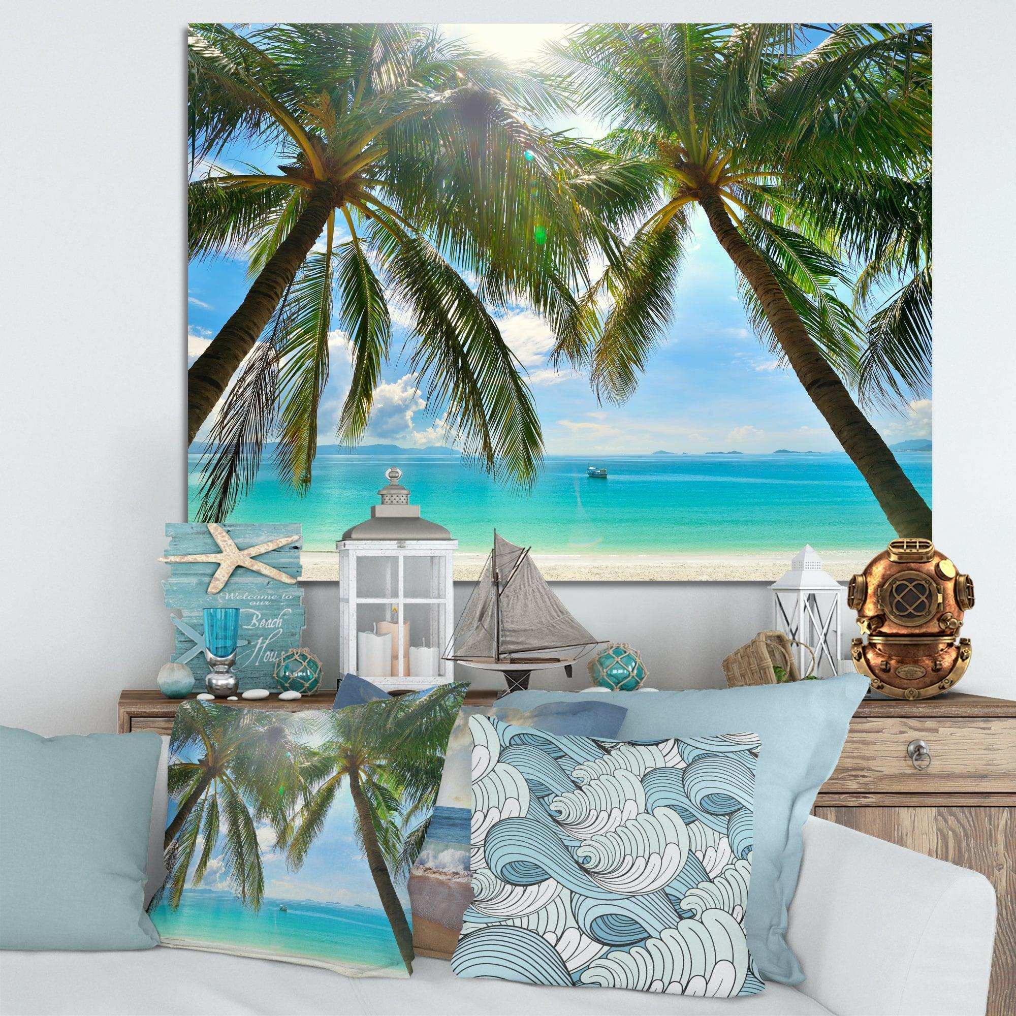 Palm Hanging over Sandy White Beach