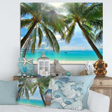 Palm Hanging over Sandy White Beach
