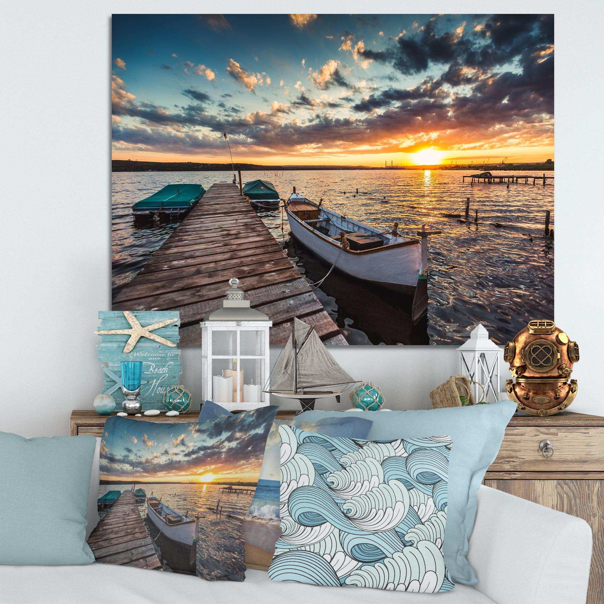 Boats and Jetty under Dramatic Sky
