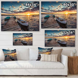 Boats and Jetty under Dramatic Sky