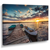 Boats and Jetty under Dramatic Sky
