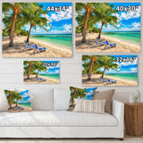 Blue chairs at the tropical white sand beach