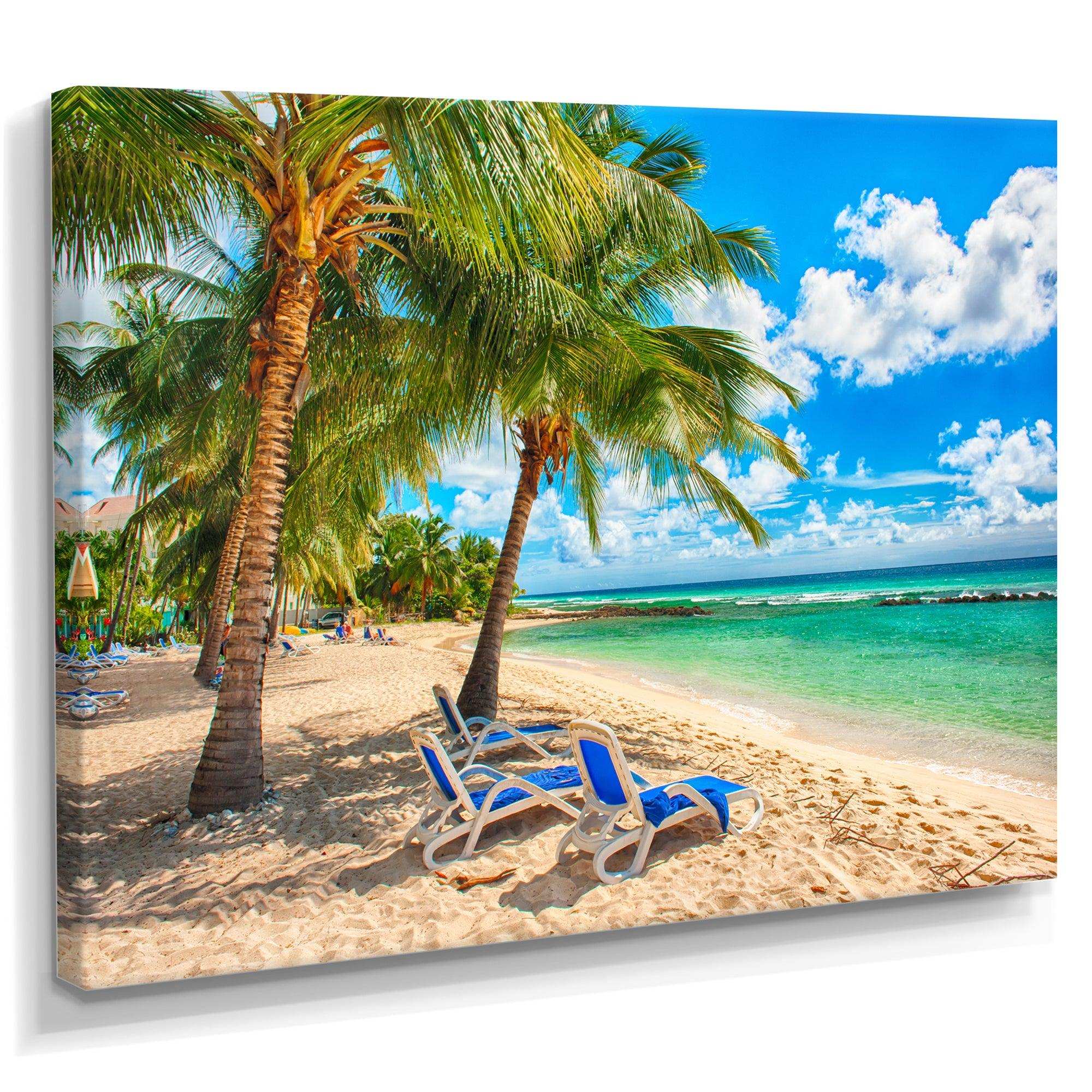Blue chairs at the tropical white sand beach