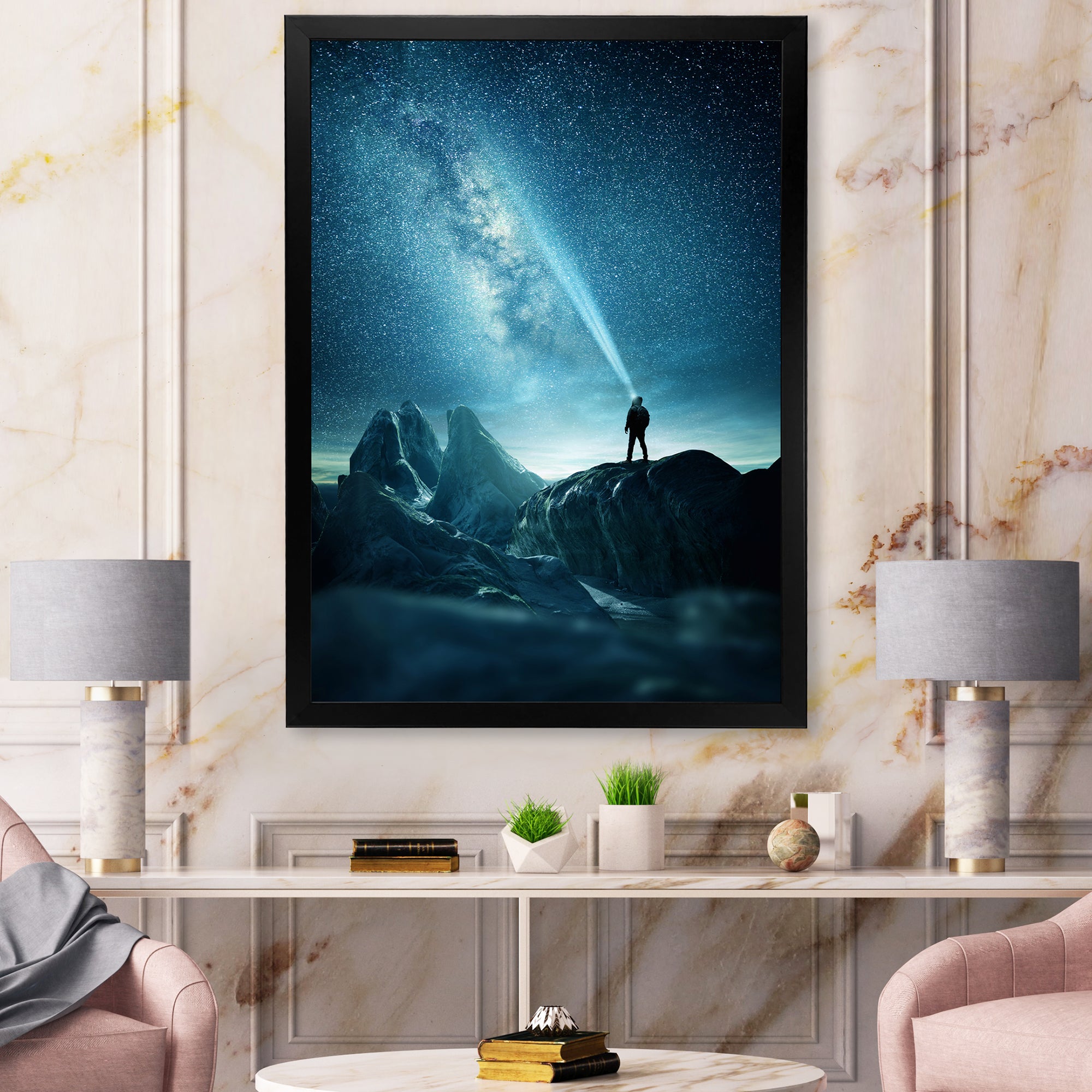 A Man Shining A Light Into The Night Sky