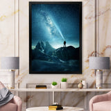 A Man Shining A Light Into The Night Sky